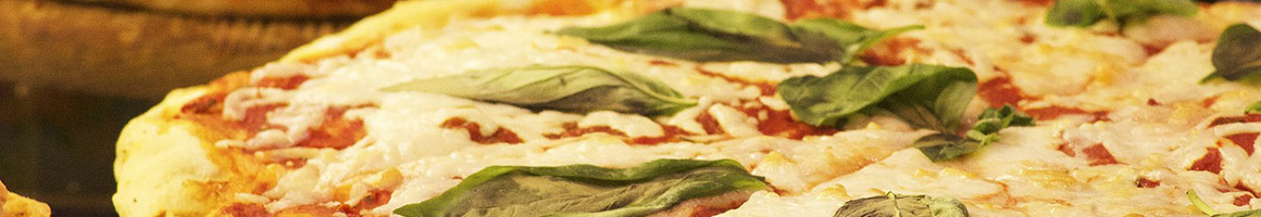 Eating Italian Pizza at Holiday Restaurant & Pizza restaurant in Ellington, CT.